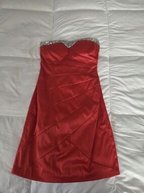 B. Smart Strapless Red Satin Dress with Silver Embellished Neckline